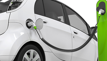 Electric vehicle being charged